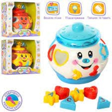 Гра 0915 UA (24шт) Горшочек,16см,сортер,муз(укр),свет,ездит,фигурк6шт,3цвета,на бат,кор,23-23-15см Гра 0915 UA (24шт) Горшочек,16см,сортер,муз(укр),свет,ездит,фигурк6шт,3цвета,на бат,кор,23-23-15см